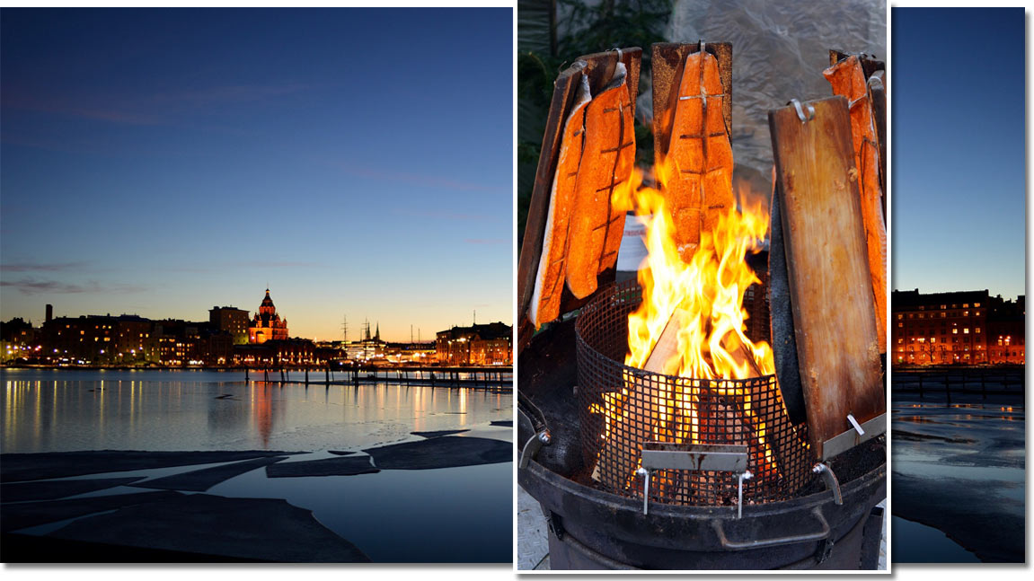 Panorama von Helsinki am Abend mit eingeblendeten Flammlachs im Feuerkorb