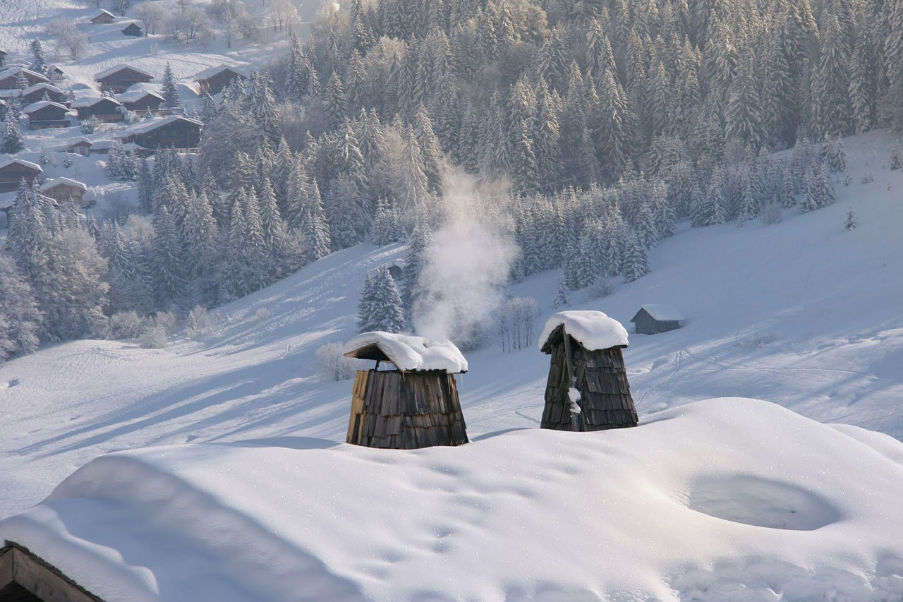 Wie hoch muss mein Schornstein über dem Dach mindestens sein?